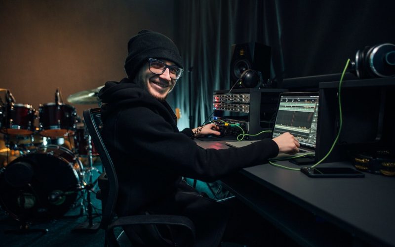 a-sound-engineer-uses-a-mixing-board-and-software-to-create-audio-track-.jpg