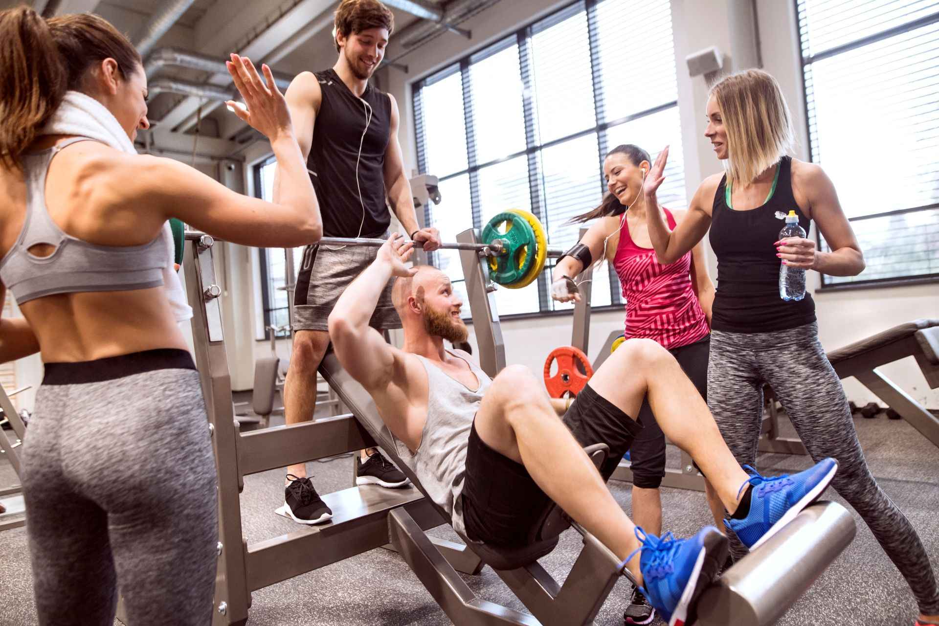 group-of-people-in-gym-training-weight-lifting-2024-09-21-17-30-48-utc_11zon.jpg