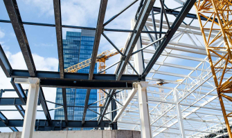 construction-site-with-steel-frame-structure-and-c-2024-10-18-08-31-20-utc_11zon.jpg