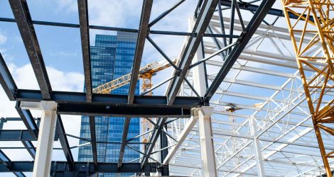 construction-site-with-steel-frame-structure-and-c-2024-10-18-08-31-20-utc_11zon.jpg