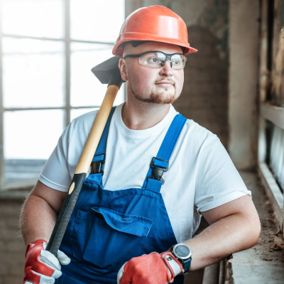 handsome-builder-stands-by-the-window-and-holds-a-2025-01-26-12-26-17-utc.jpg