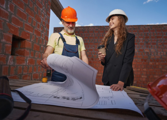 joyful-woman-smiling-at-worker-during-bluepring-ex-2023-11-27-05-10-52-utc.jpg