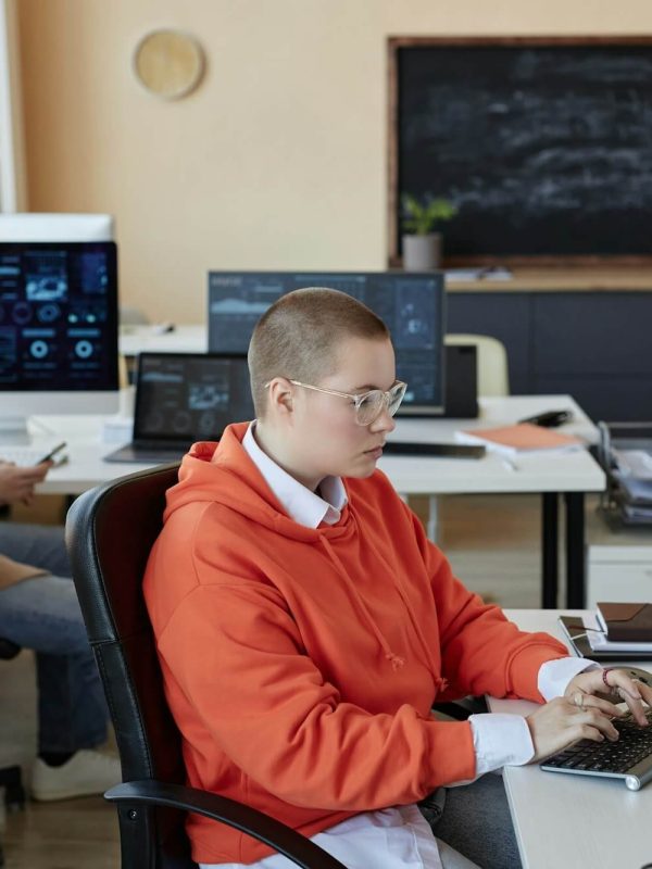 side-view-of-young-busy-female-specialist-in-cyber-security-networking.jpg
