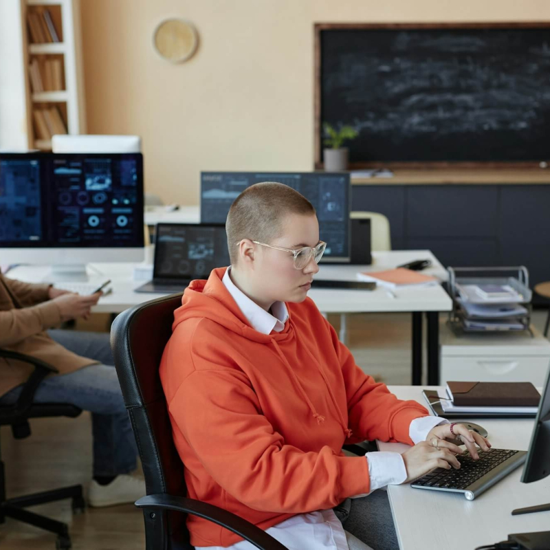 side-view-of-young-busy-female-specialist-in-cyber-security-networking.jpg