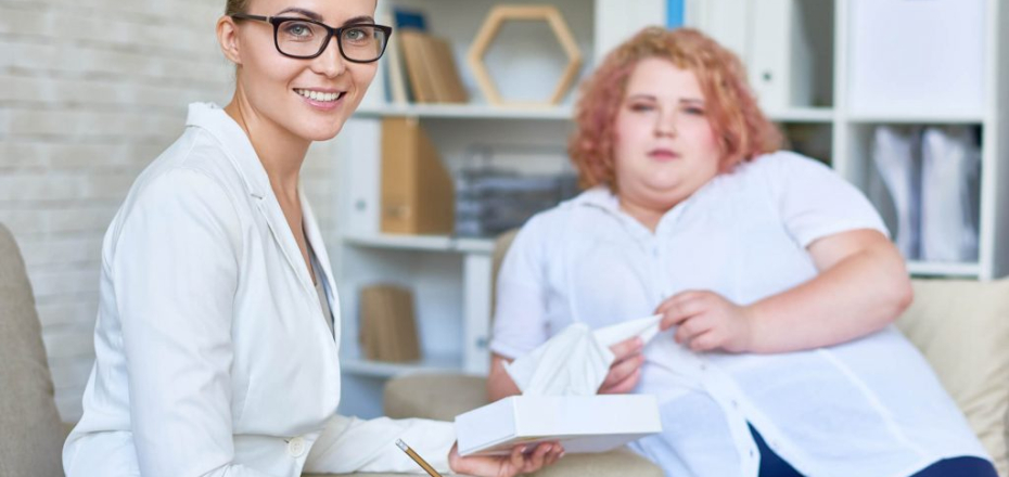 beautiful-psychiatrist-posing-during-therapy-sessi-HX3FLGP-1024x684