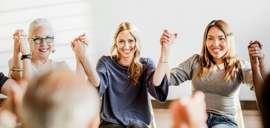 group-of-diverse-people-holding-hands-up-in-the-ai-MAJ7XT5-1024x682